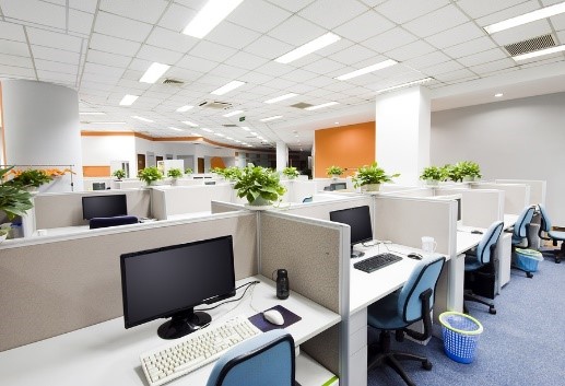An office with rows of cubicles